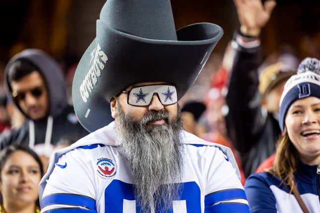 A Dallas Cowboys fan watches from the stands during the NFC Divisional Playoff game between the Dallas Cowboys and San Francisco 49ers at Levis Stadium.