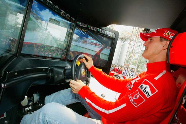 Seven-time Formula 1 champion Michael Schumacher plays Ferrari F355 Challenge, a simulation racing game designed by Yu Suzuki, in Tokyo in 2003. F355 Challenge utilized Sega’s NAOMI arcade hardware, which replaced Model 3 and employed the same architecture as the company’s final home console, the Dreamcast. 