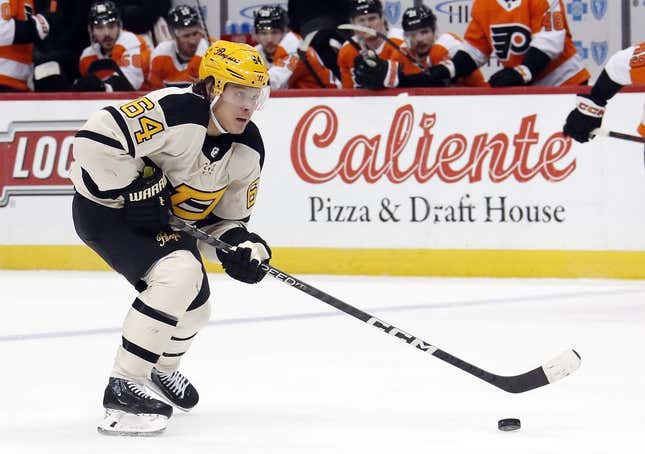 Mar 11, 2023; Pittsburgh, Pennsylvania, USA;  Pittsburgh Penguins center Mikael Granlund (64) skates with the puck against the Pittsburgh Penguins during the third period at PPG Paints Arena.  Pittsburgh won 5-1.