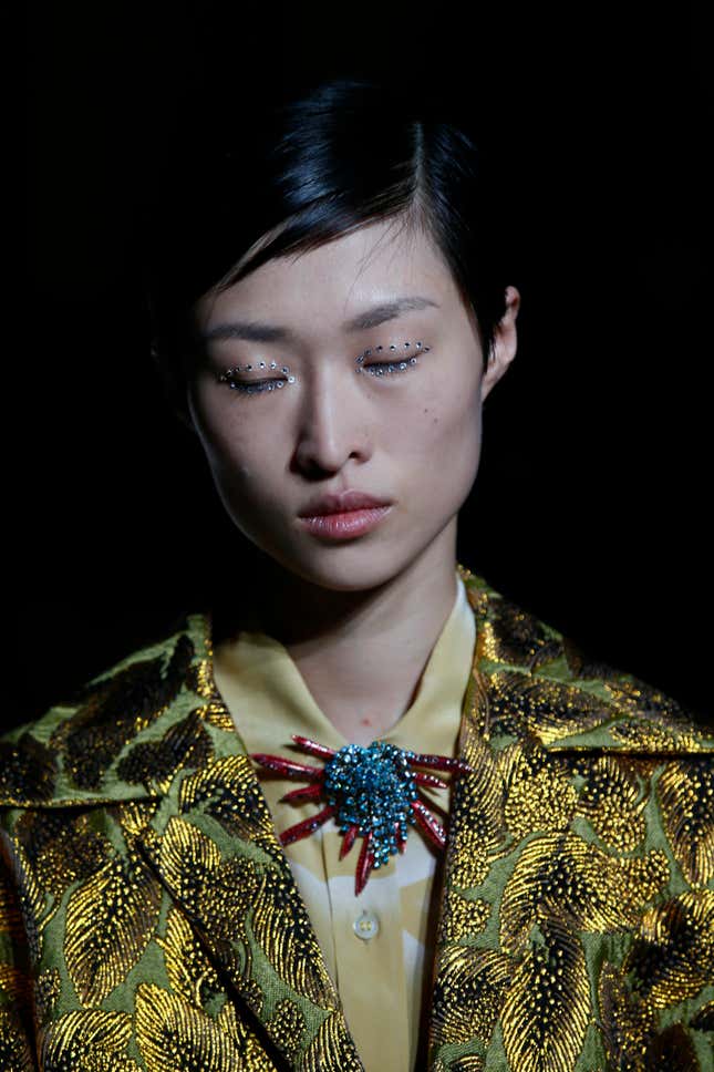 A model wears a creation as part of Dries Van Noten Spring-Summer 2018 ready-to-wear fashion collection presented Wednesday, Sept. 27, 2017 in Paris. (AP Photo/Francois Mori)