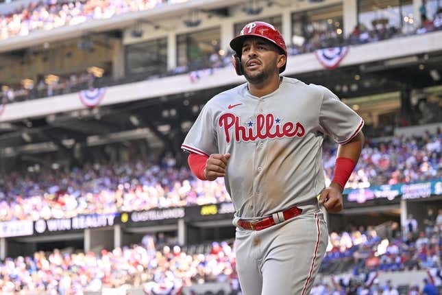 Apr 1, 2023; Arlington, Texas, USA; Philadelphia Phillies first baseman Darick Hall (24) runs off the field after scoring against the Texas Rangers during the fourth inning at Globe Life Field.