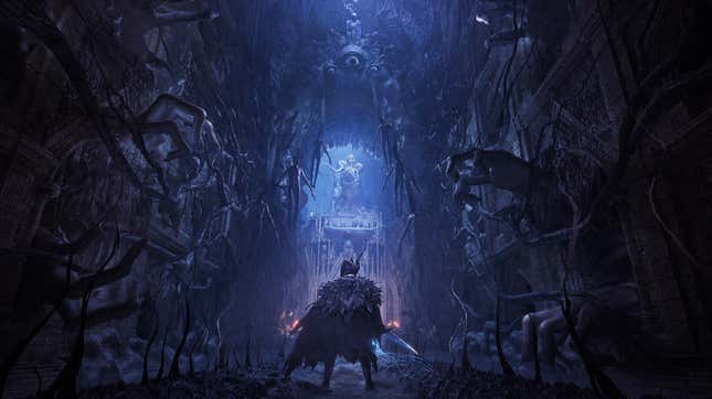 A Lords of the Fallen character looks down a creepy hall toward what appears to be some sort of statue.