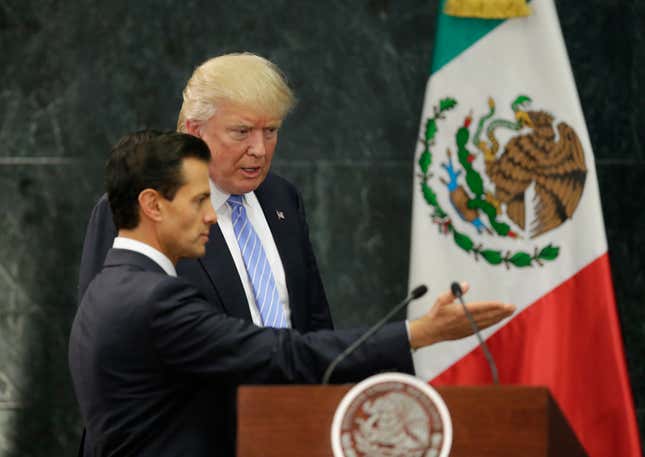 Donald Trump and Mexico’s president Enrique Pena Nieto arrive for a press conference at the Los Pinos residence in Mexico City, Mexico, August 31, 2016.