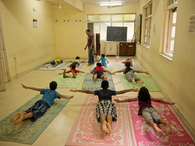 Image for article titled Where yoga is still about spirituality—not detox smoothies and perfect bodies