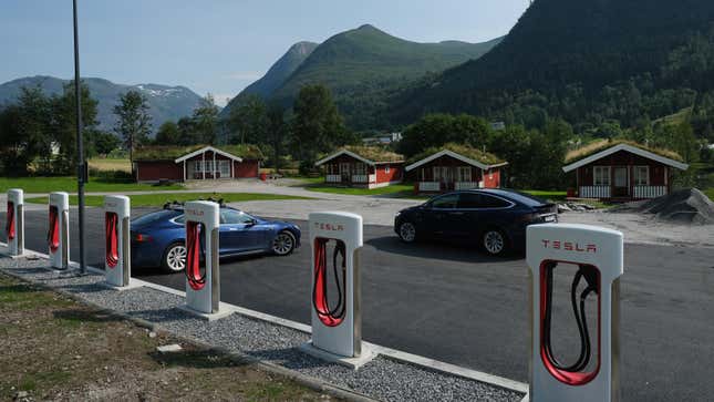 Two Teslas in Norway line up near Tesla superchargers
