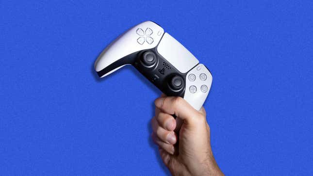 A hand grips the PlayStation 5 controller by its right handle in front of a blue background.