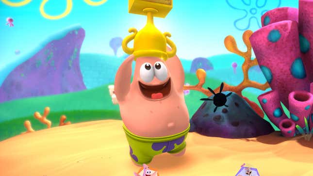 SpongeBob character Patrick Star holds a trophy above his head.