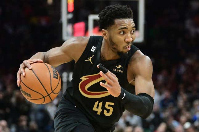 Mar 6, 2023; Cleveland, Ohio, USA; Cleveland Cavaliers guard Donovan Mitchell (45) drives to the basket against the Boston Celtics during the second half at Rocket Mortgage FieldHouse.