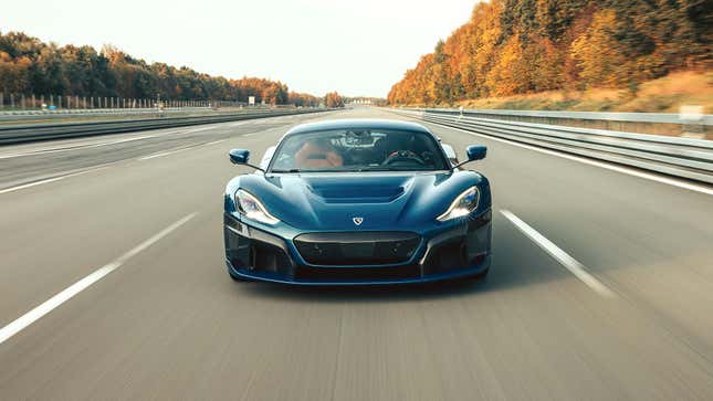 A Rimac Nevera driving down a highway
