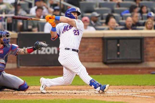 Aug 30, 2023; New York City, New York, USA;  New York Mets right fielder DJ Steward (29) hits a home run against the Texas Rangers during the second inning at Citi Field.