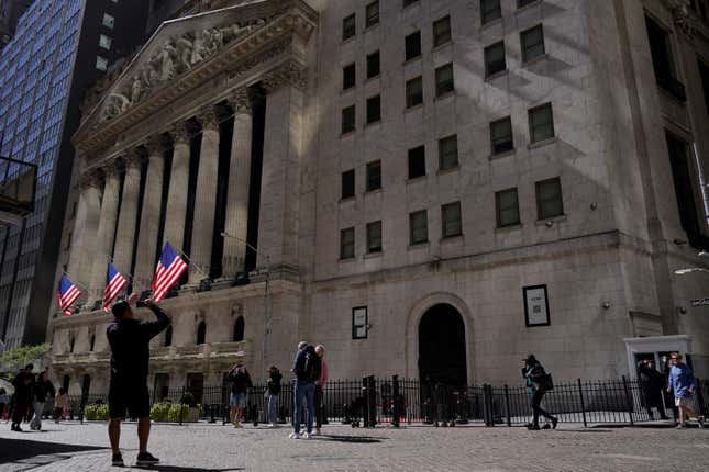 FILE - A visitor take a photo of the New York Stock Exchange, Friday, Sept. 23, 2022, in New York. (AP Photo/Mary Altaffer, File)