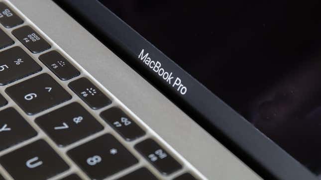 A closeup of a Macbook keyboard and screen