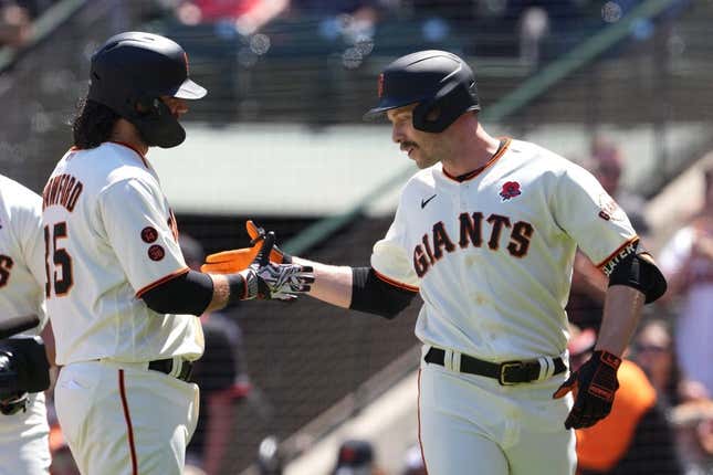 May 29, 2023; San Francisco, California, USA; San Francisco Giants left fielder Austin Slater (right) celebrates with shortstop Brandon Crawford (left) after hitting a home run against the Pittsburgh Pirates during the second inning at Oracle Park.