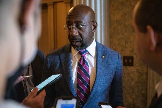 Sen. Raphael Warnock (D-Ga.) speaks to reporters as he departs a vote on the Senate floor on Capitol Hill on August 6, 2022, in Washington, DC.