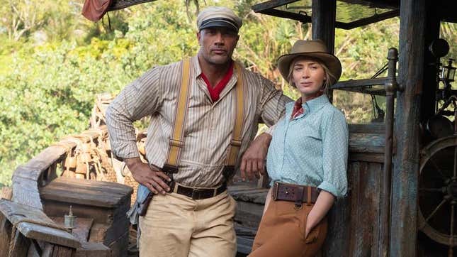 Jungle Cruise stars Dwayne Johnson and Emily Blunt pose in their best explorer's gear in a scene from the movie.