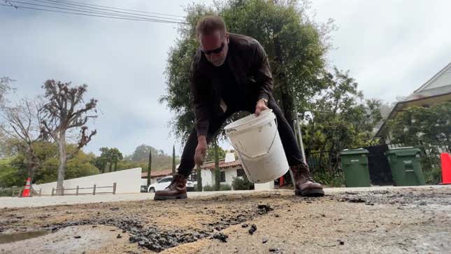 Image for article titled Arnold Schwarzenegger Patched a Service Trench He Thought Was a Pothole