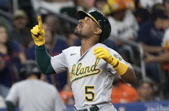 Sep 12, 2023; Houston, Texas, USA; Oakland Athletics left fielder Tony Kemp (5) reacts while rounding the bases after hitting a home run against the Houston Astros in the fifth inning at Minute Maid Park.