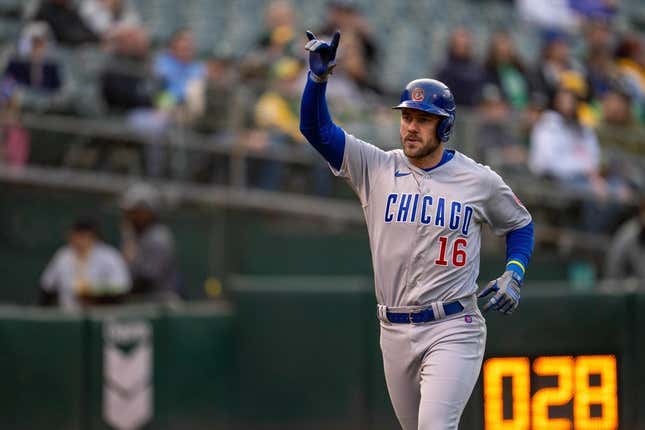Apr 17, 2023; Oakland, California, USA;  Chicago Cubs third baseman Patrick Wisdom (16) celebrates as he touches home plate after hitting a solo home run against the Oakland Athletics during the second inning at RingCentral Coliseum.
