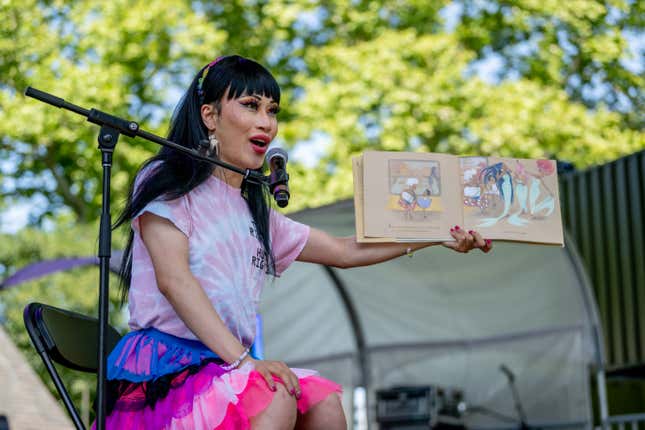 Drag queen Yuhua Hamasaki performs "Drag Queen Story Hour" during Youth Pride at Rumsey Playfield, Central Park on June 25, 2022 in New York City.