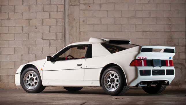 A photo of a white Ford RS200