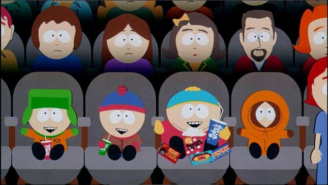 The boys from South Park sit together in a movie theater.