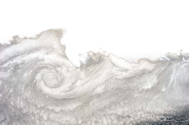 A twist of cloud near Arica, Chile. North of the equator, the spiral would turn counter-clockwise.