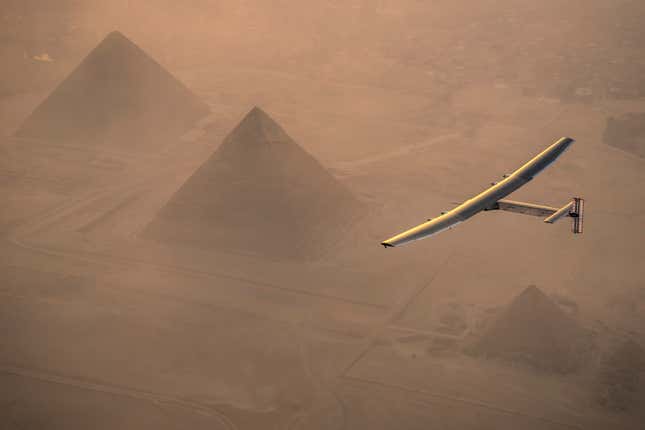 Solar Impulse flying over the Great Pyramids.