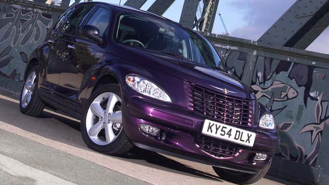 A photo of a purple Chrysler PT Cruiser SUV. 
