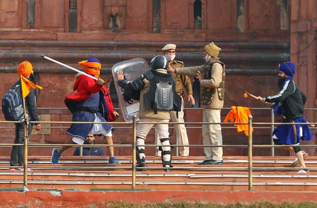 The clash between the protestors and the police at Red Fort.