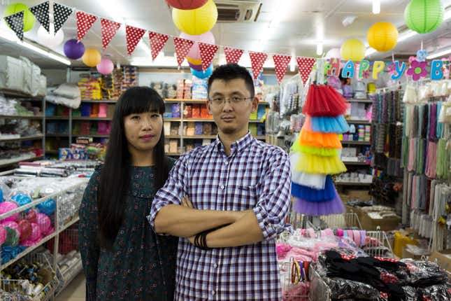 Jennifer and Jeremy Zhao pose in their party decorations and gift store at China City in Doornfontein, Johannesburg.