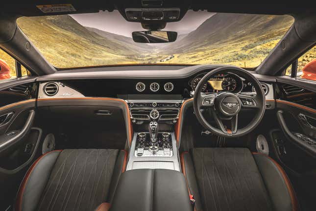 Black and orange right-hand drive Bentley interior.