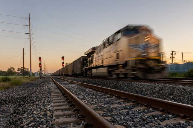 A freight train travels through Houston on September 14, 2022 in Houston, Texas. 