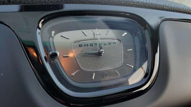Close-up of a car clock featuring the Chrysler logo in Walnut Creek, California, USA, October 23, 2020.
