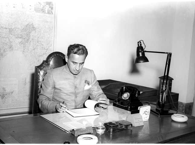 CD Deshmukh glancing through the budget for the year 1954-55 before its presentation in parliament on Feb. 27, 1954.
