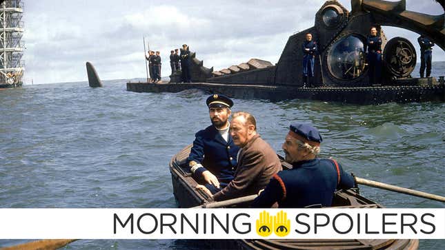 Captain Nemo and his crew row toward the legendary submarine Nautilus.