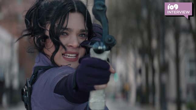 Kate Bishop lining up a shot with her bow and arrow.