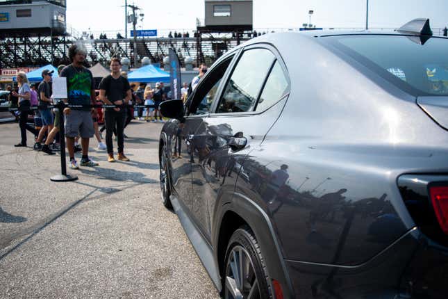 Photo of the 2022 WRX from the rear, showcasing character lines along the side.