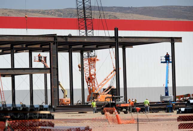 Workers continue construction work at the Tesla Gigafactory under construction near Sparks, Nevada, U.S. July 26, 2016. REUTERS/James Glover II - RTSJT88
