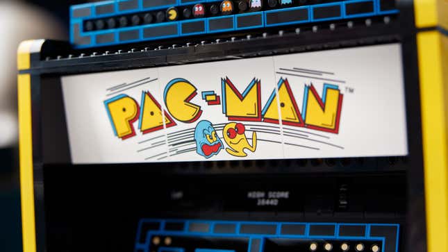 A close-up of nan Lego Pac-Man Arcade Machine Set's marquee featuring vintage furniture graphics.