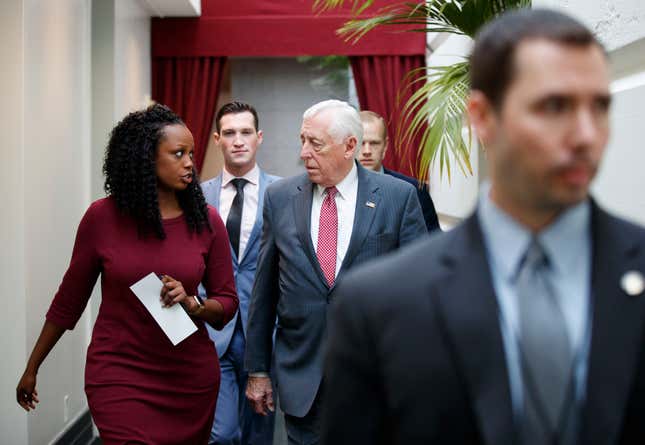 Shuwanza Goff, left, speaks with House Majority Leader Steny Hoyer of Md., as they walk to a Closed Democratic Caucus meeting on Capitol Hill in Washington, Friday, Jan. 4, 2019. Goff is the first African-American woman to serve as floor director in Hoyer’s office.