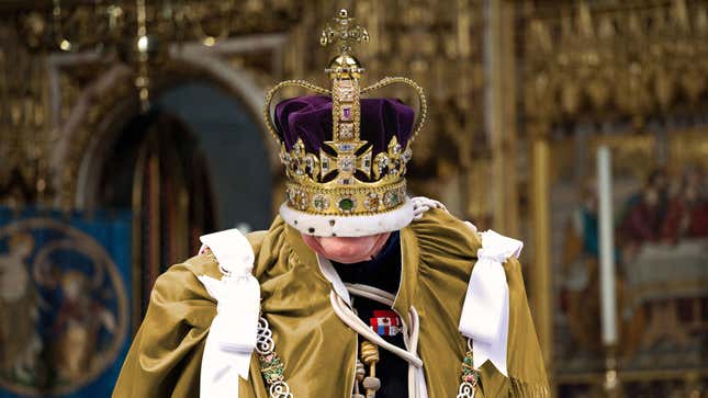 Image for article titled Panicked King Charles III Flails Wildly After Getting Head Stuck Inside Coronation Crown