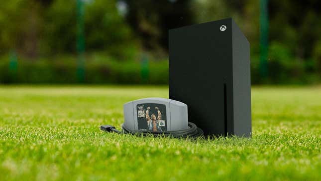 Image for article titled Unlikely Friendship: This Baby Xbox Is Best Friends With An N64 ‘WWF War Zone’ Cartridge