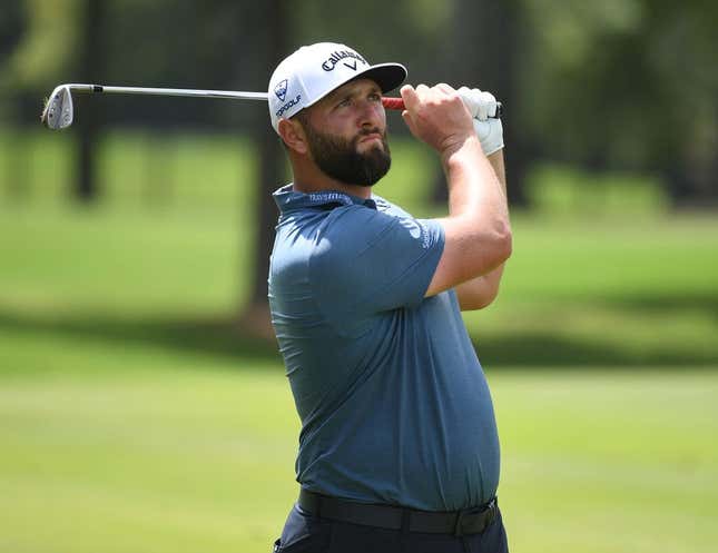 Aug 11, 2023; Memphis, Tennessee, USA; Jon Rahm watches his second shot on the ninth hole during the second round of the FedEx St. Jude Championship golf tournament.