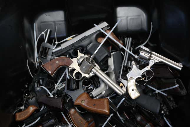 A pile of surrendered handguns