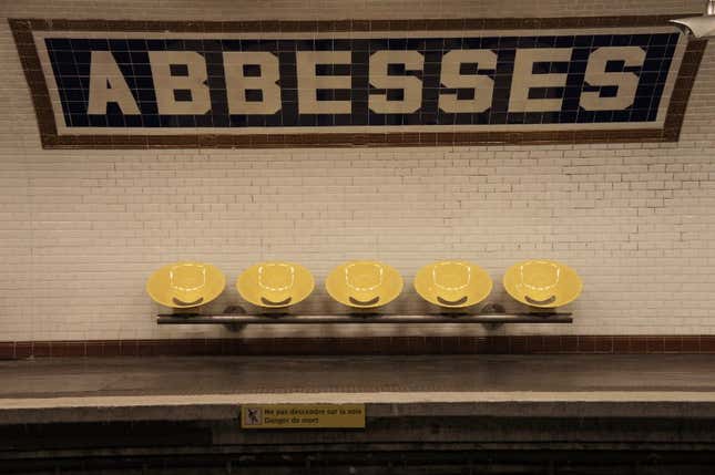 Seats for scale. The name of the station is clearly visible from anywhere inside the train.