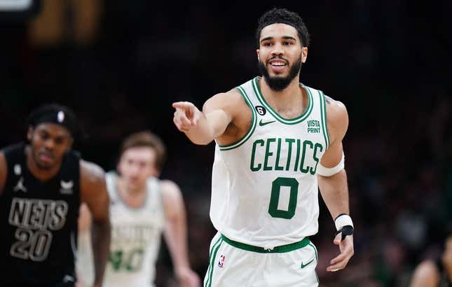 Feb 1, 2023; Boston, Massachusetts, USA; Boston Celtics forward Jayson Tatum (0) reacts after his three point basket against the Brooklyn Nets in the second half at TD Garden.