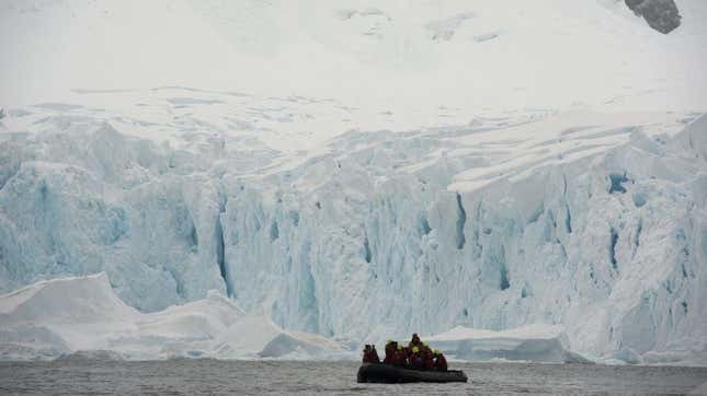 Tourists cruise the western Antarctic peninsula on March 04, 2016. The Antarctic tourism industry is generally considered to have begun in the late 1950s when Chile and Argentina took more than 500 fare-paying passengers to the South Shetland Islands aboard a naval transportation ship.
