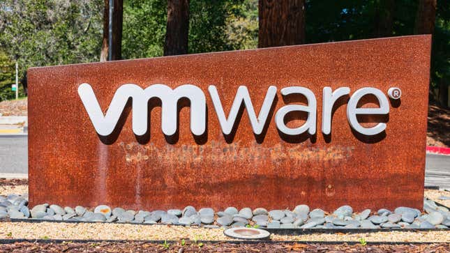 A rusty sign bearing the logo of VMware