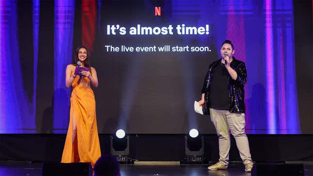 Chloe Veitch and Chris Burns onstage at the Love Is Blind live reunion watch party