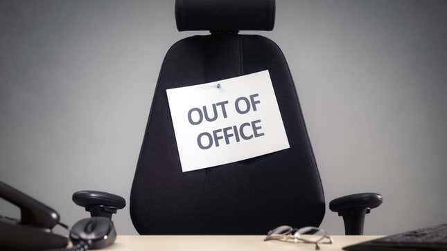 stock photo of "out of office" sign on a desk chair
